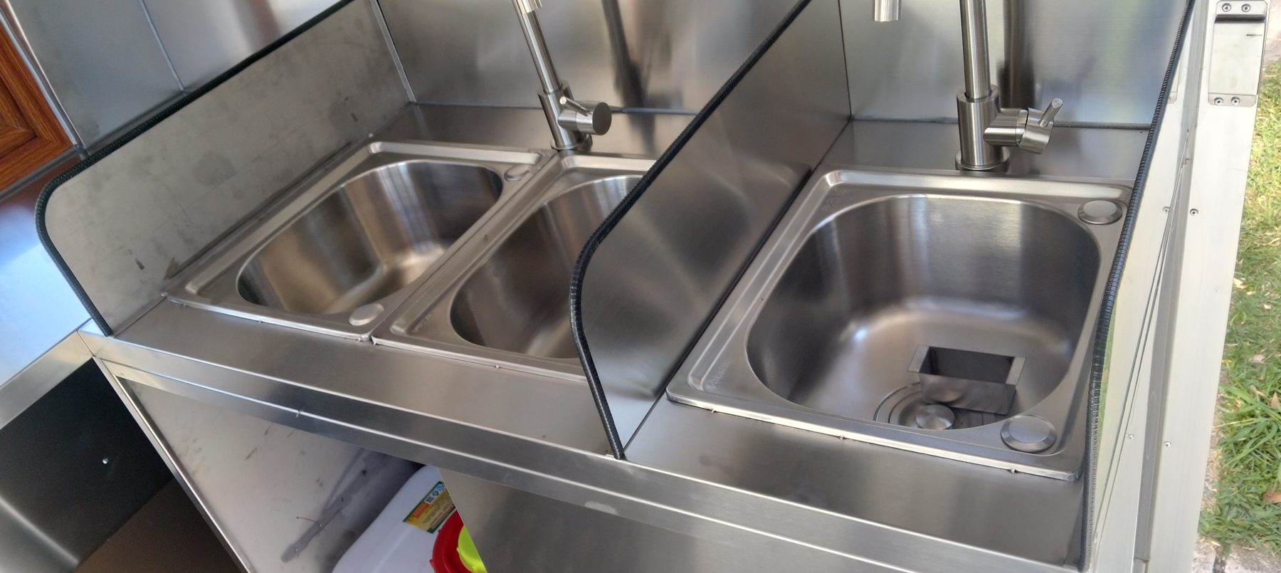Stainless triple sink with hot water